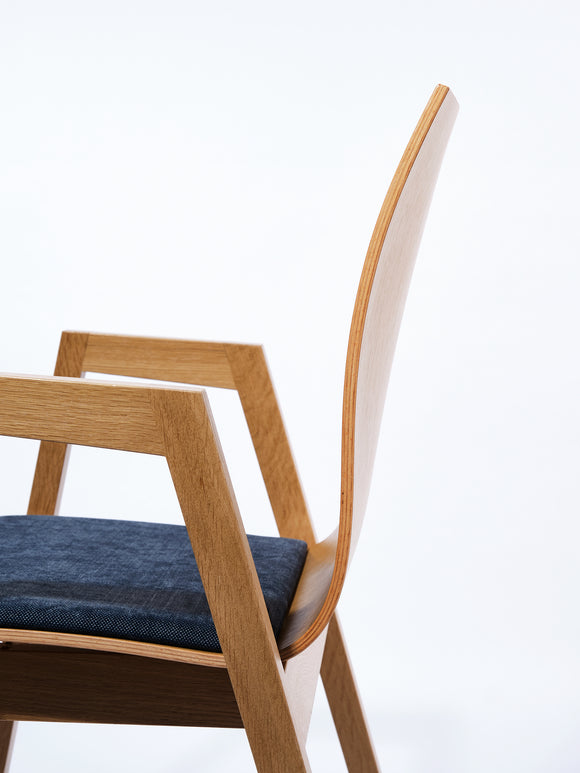 Lavabis stacking chair upholstered wood with armrest