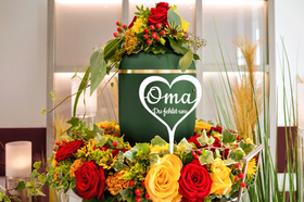 Tassello della tomba "Nonna ci manchi"